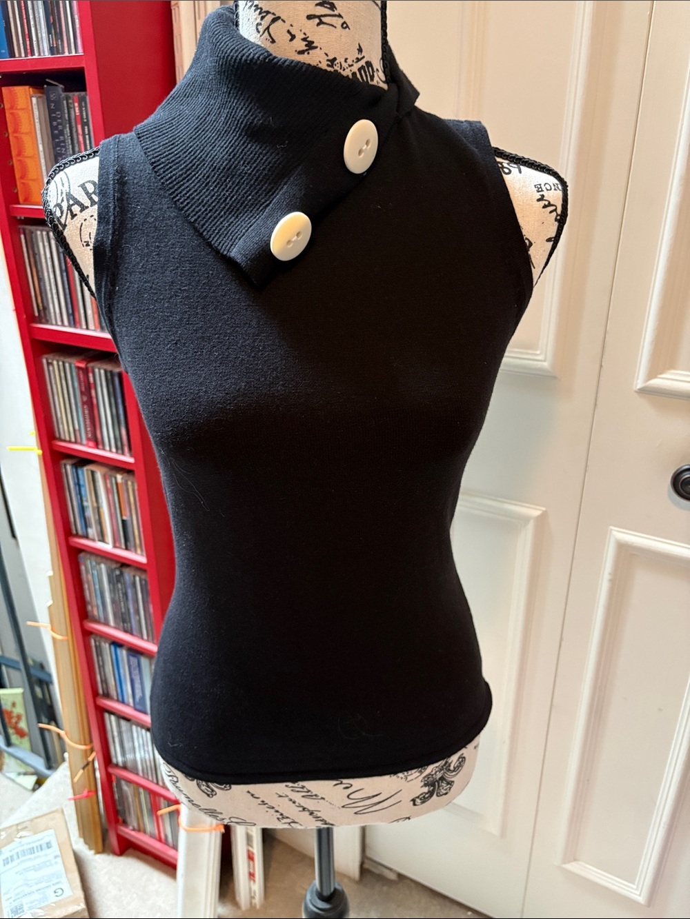 Black Sleeveless Mock Neck Top with Button Detail